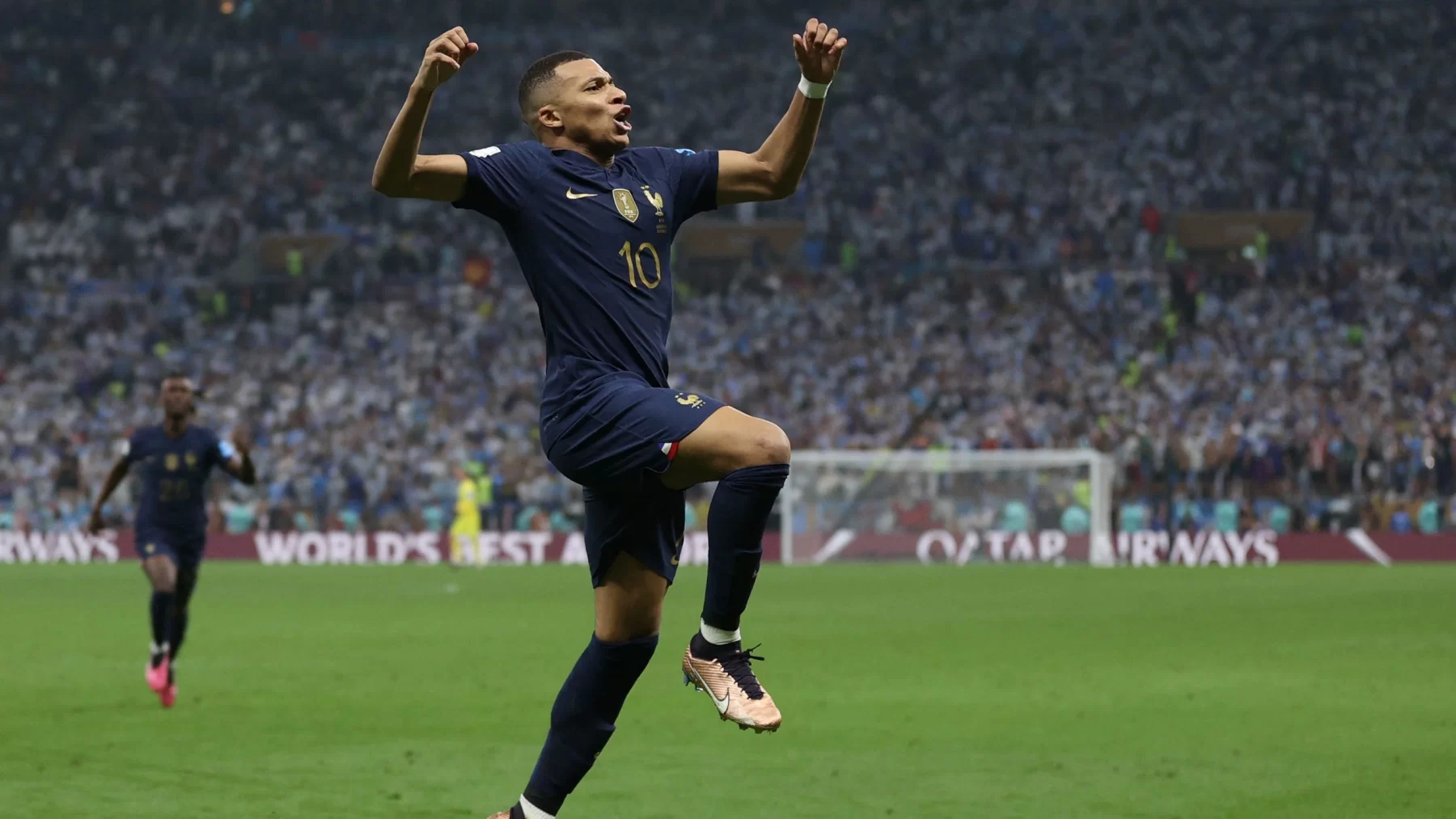 ADRIAN DENNIS AFP via Getty Images Mbappe comemora