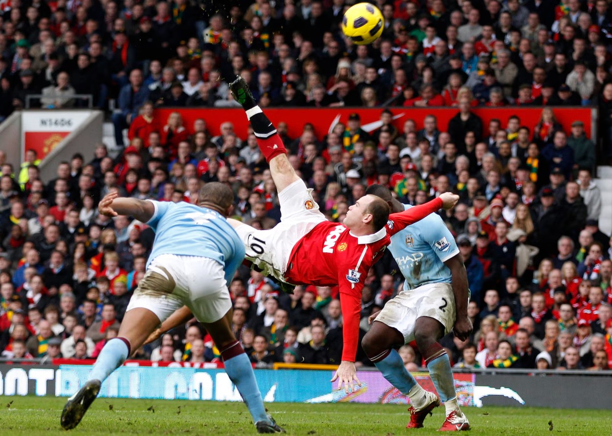 rooney bicicleta man united man city